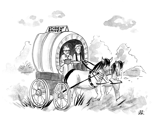 A young man drives a covered wagon as a man sits beside him with a clipboard. A sign on the wagon says, "Student Driver."