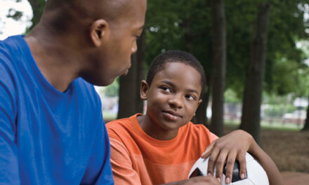 ‘It’s not like family, it is family’: Reflections on a mentoring program for boys of color 