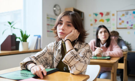 A bored student wants to ask their teacher for student involvement opportunities